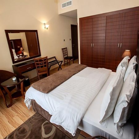 Xclusive Maples Hotel Apartment Dubai Room photo