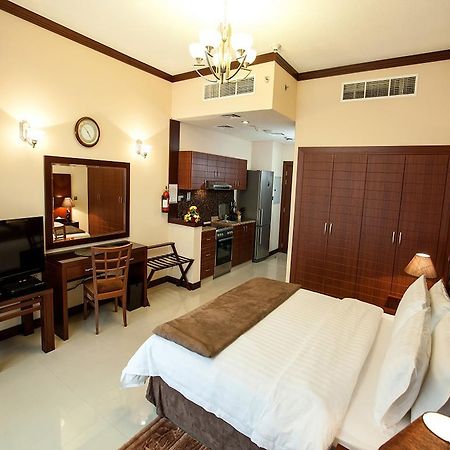 Xclusive Maples Hotel Apartment Dubai Room photo