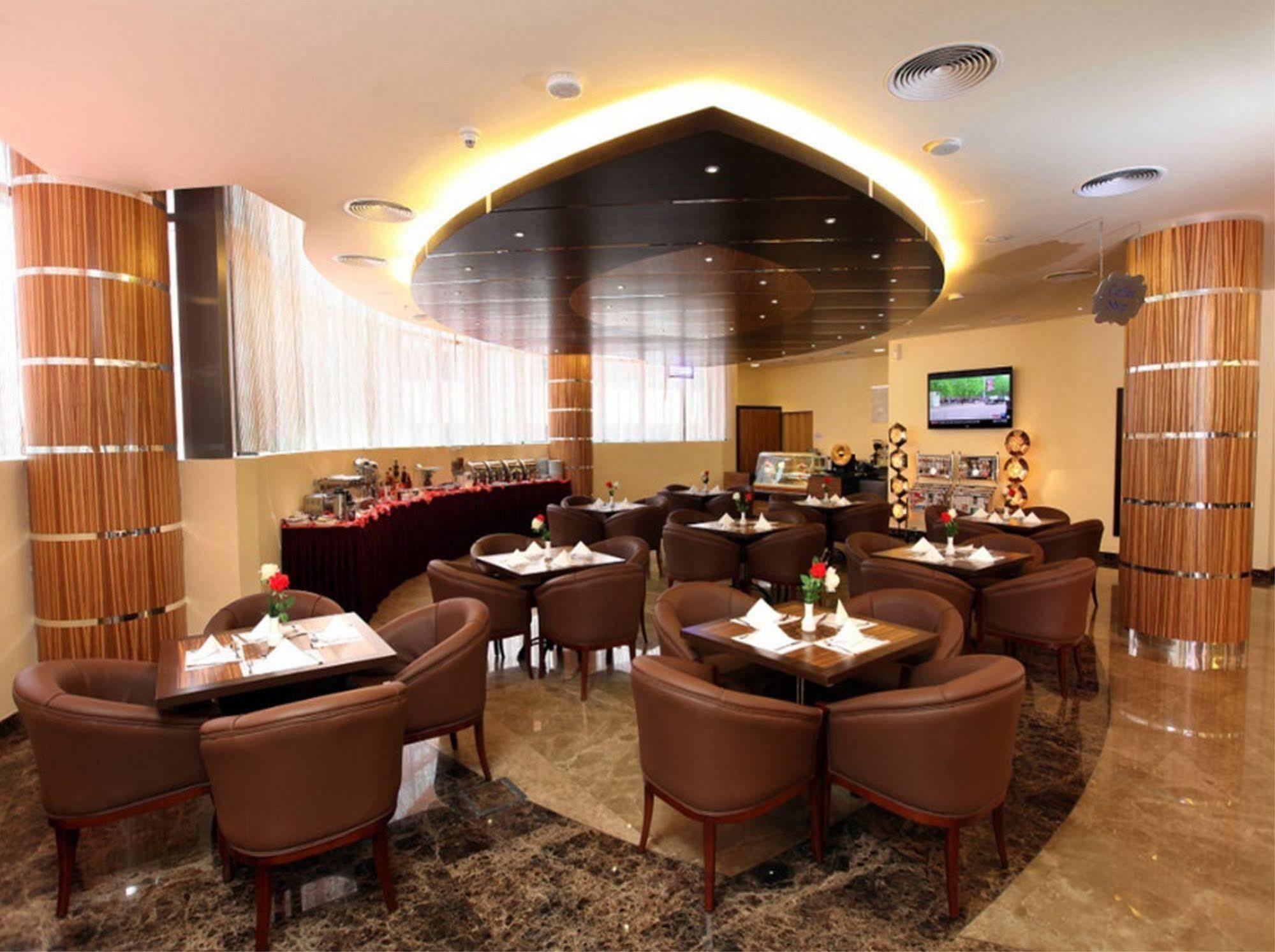 Xclusive Maples Hotel Apartment Dubai Restaurant photo